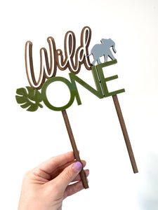 Wild one cake topper with elephant and monstera leaf