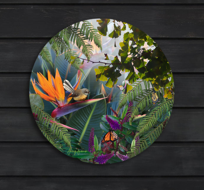 Featuring a fantail in a tropical garden with monarch butterflies